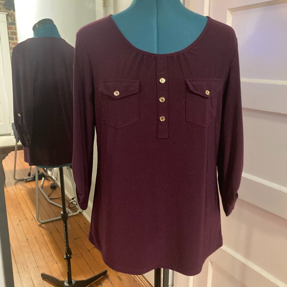 Purple pull over shirt